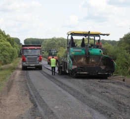 Работы по устройству асфальтового покрытия автомобильной дороги